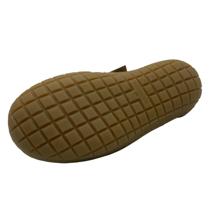 Bottom view of wool slip on shoe with brown rubber outsole