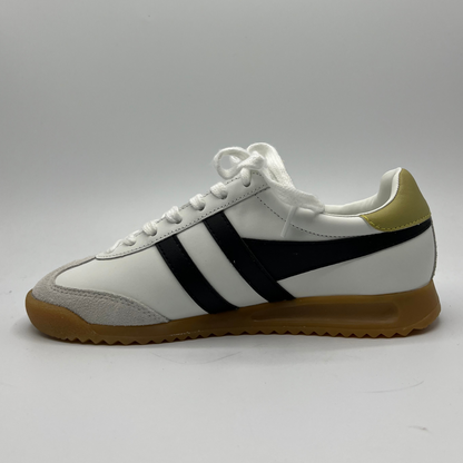 Left facing view of a leather sneaker with a brown rubber outsole and a lace up design.