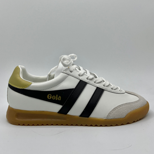 Right facing view of a leather sneaker with a brown rubber outsole and a lace up design.