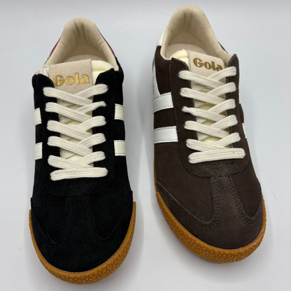 Two low-top suede sneakers shown side by side on a light gray background. The left shoe is black with off-white laces and side stripes, and the right shoe is dark brown with off-white laces and side stripes.