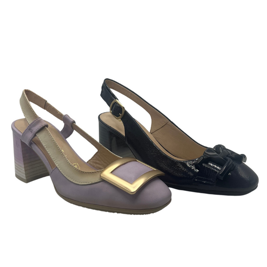45 degree angled view of two shoes. Both have sling back straps and chunky heels. One is lavender and one is black
