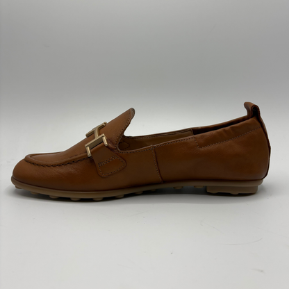 Brown loafer shoe on a white background