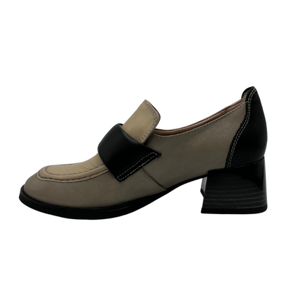 Left facing view of beige and black leather loafer with block stacked heel and rounded toe