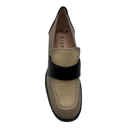 Top view of beige and black leather loafer with block stacked heel and rounded toe