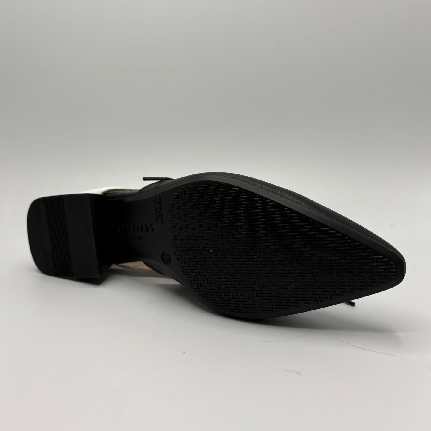 Black shoe sole on a white background