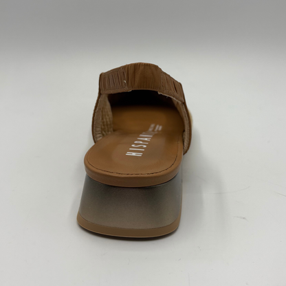 Brown sandal with a visible brand name on a white background