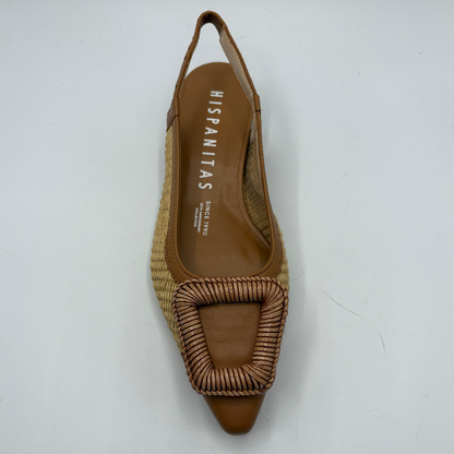 Brown sandal with woven design on a white background