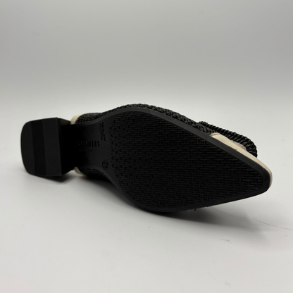 Black shoe sole with textured pattern on a white background