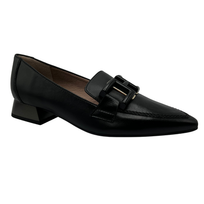 45 degree angled view of black leather loafer with pointed toe, buckle detail and block heel