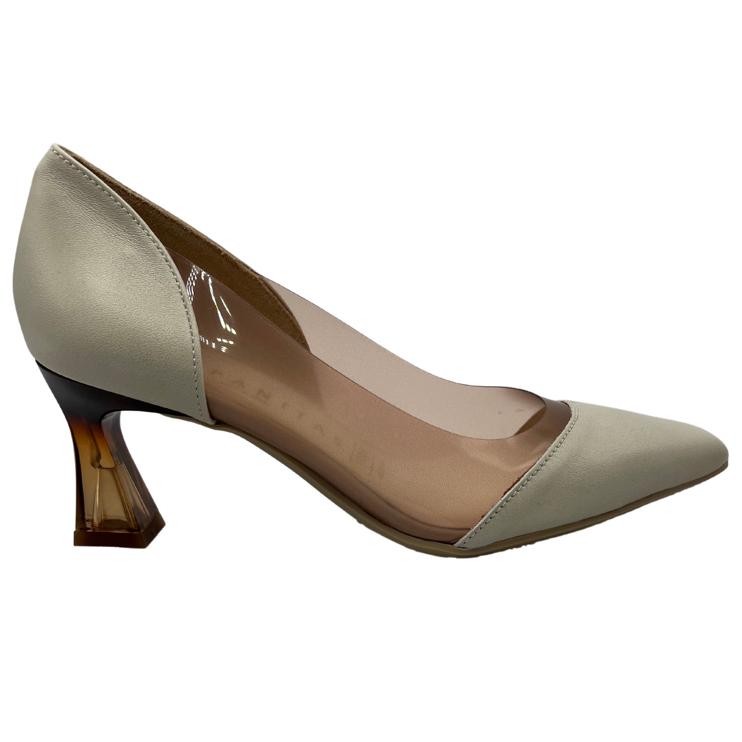 Right facing view of white and nude pump with pointed toe and flared heel