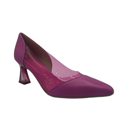 45 degree angled view of pink leather and vinyl pump with flared heel and pointed toe
