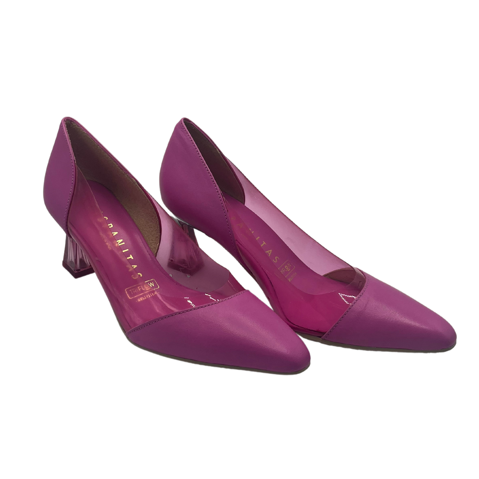 45 degree angled view of a pair of pink leather and vinyl pumps with pointed toes