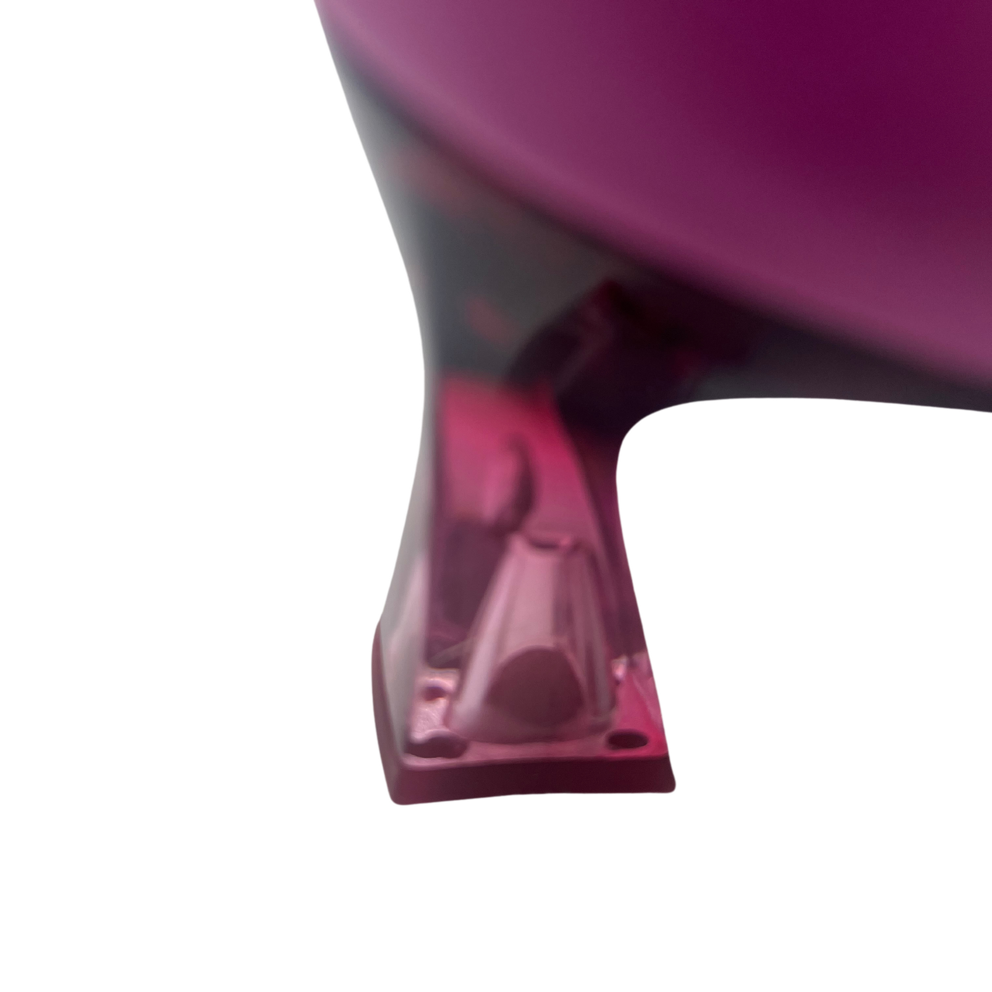 View of the flared lucite pink heel on a pump shoe