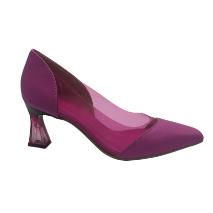 Right facing view of pink pump with flared heel and pointed toe