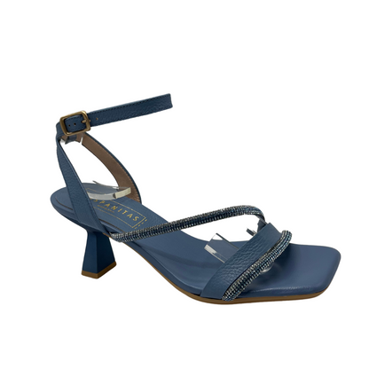 Angled view of blue leather strappy  sandal with a flared kitten heel and embellished accent straps.