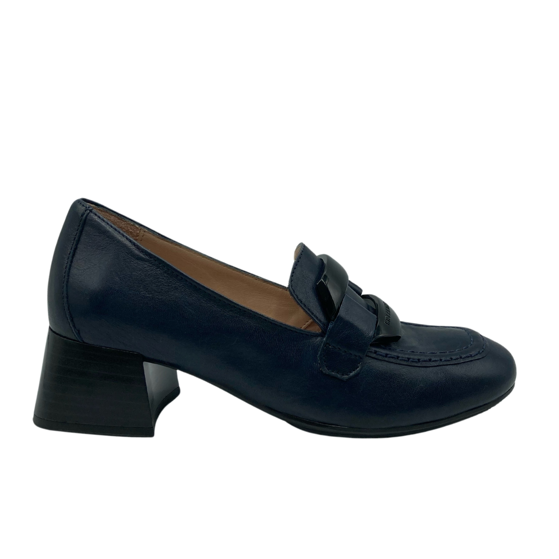 Right facing view of navy leather loafer with block heel and leather lining