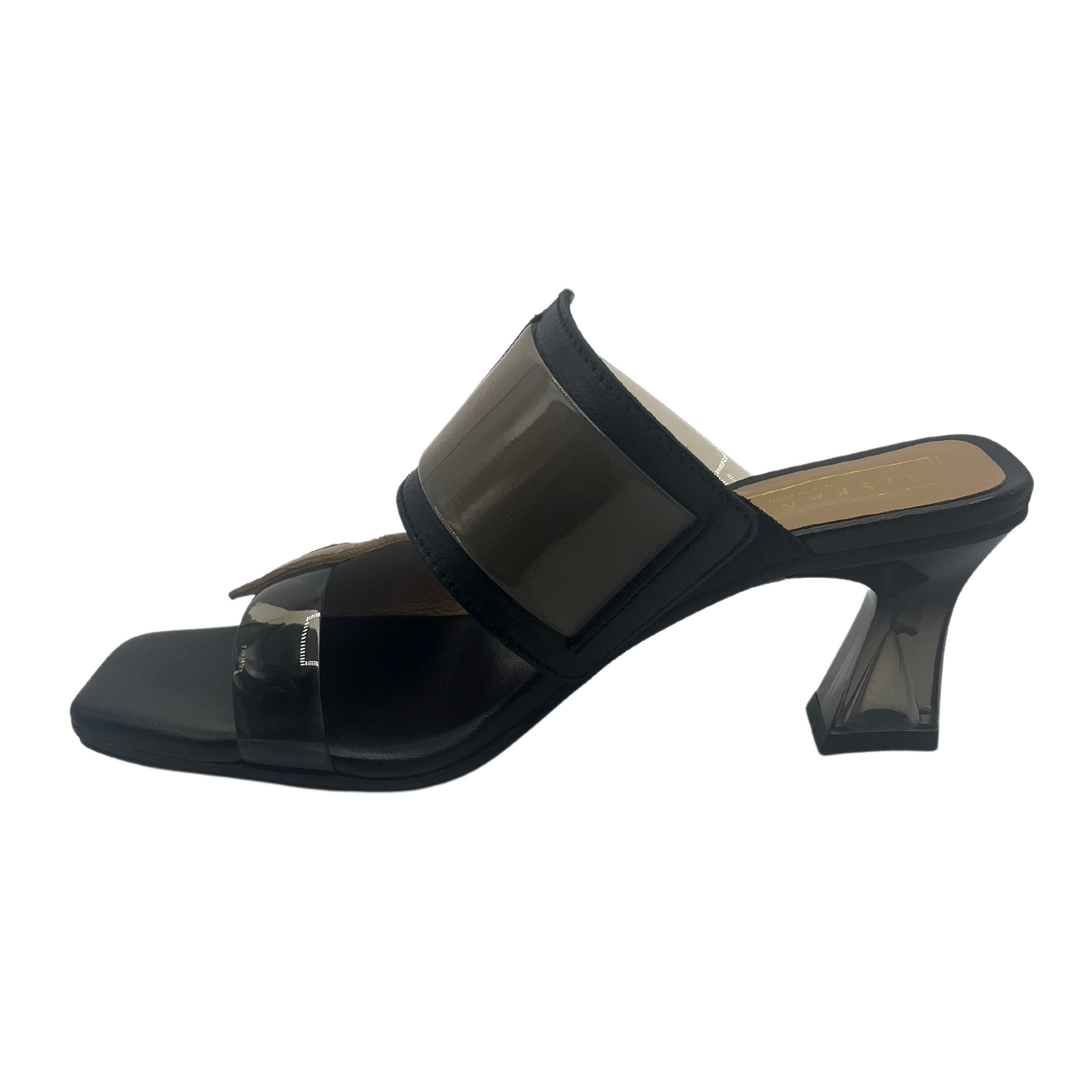 Left facing view of leather and vinyl shoe with square toe and flared lucite heel