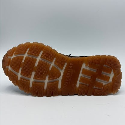 The outsole of a brown rubber shoe or boot, showing a textured tread pattern and the embossed brand name 'HISPANTAS'.