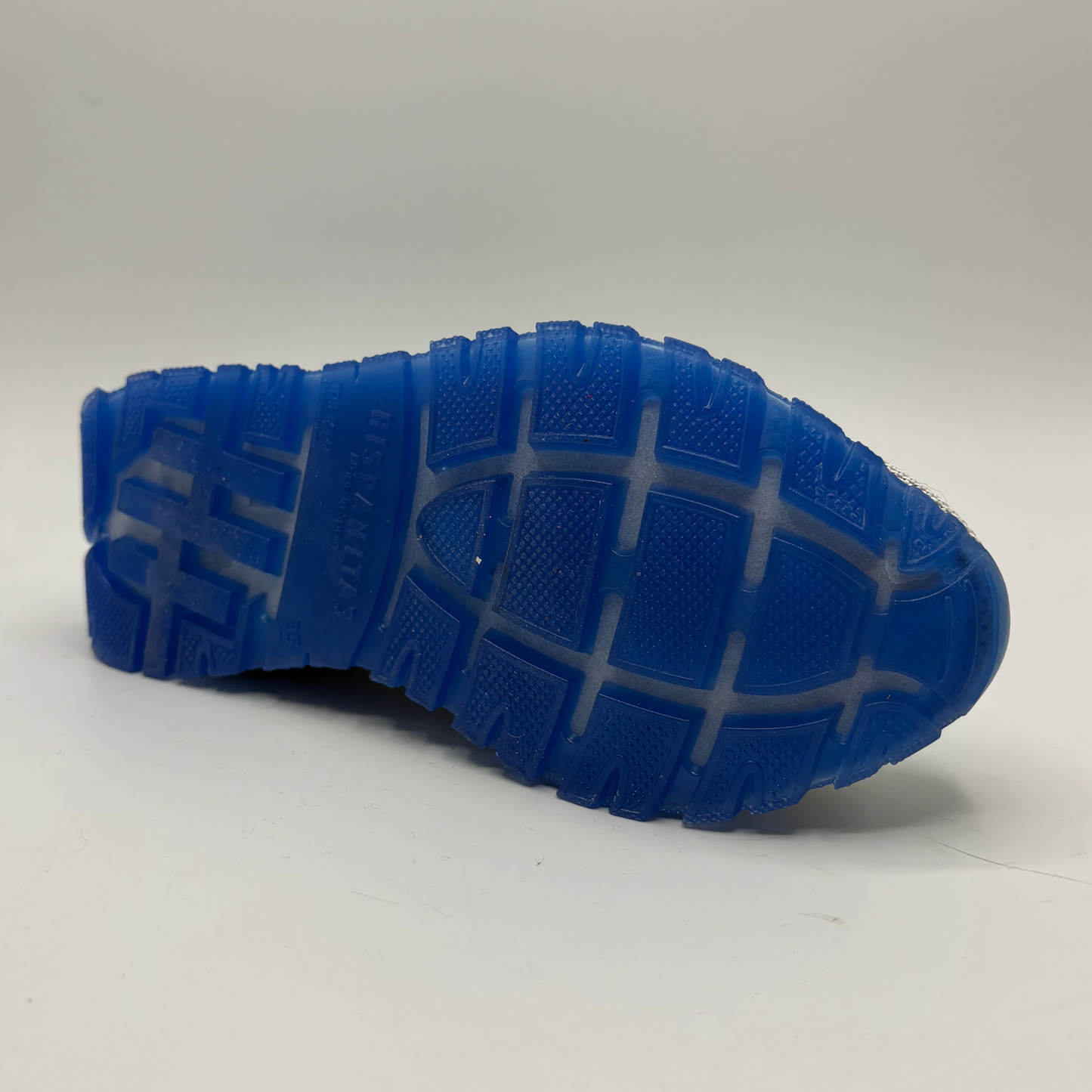 Blue sole of a shoe on a white background