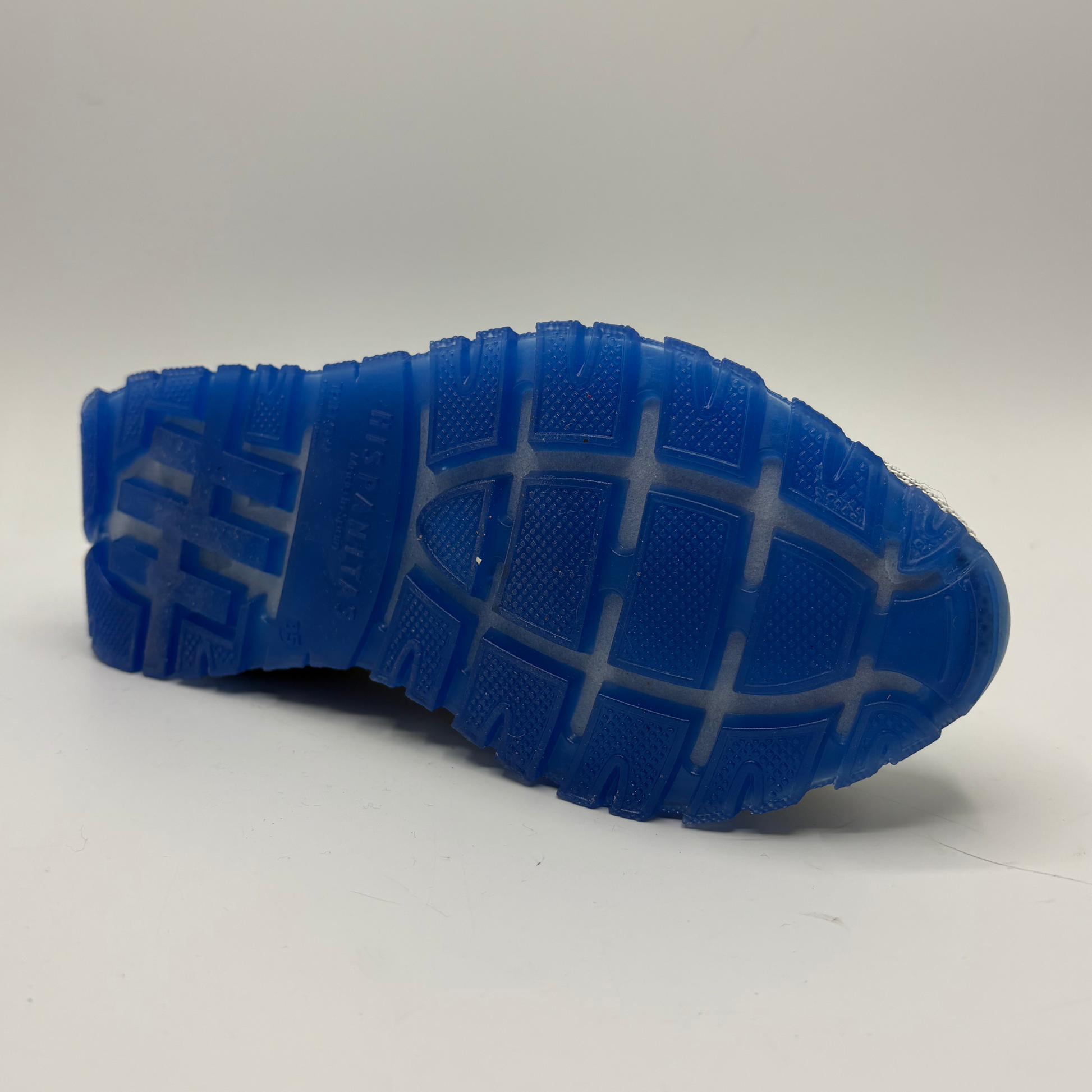 Blue sole of a shoe on a white background