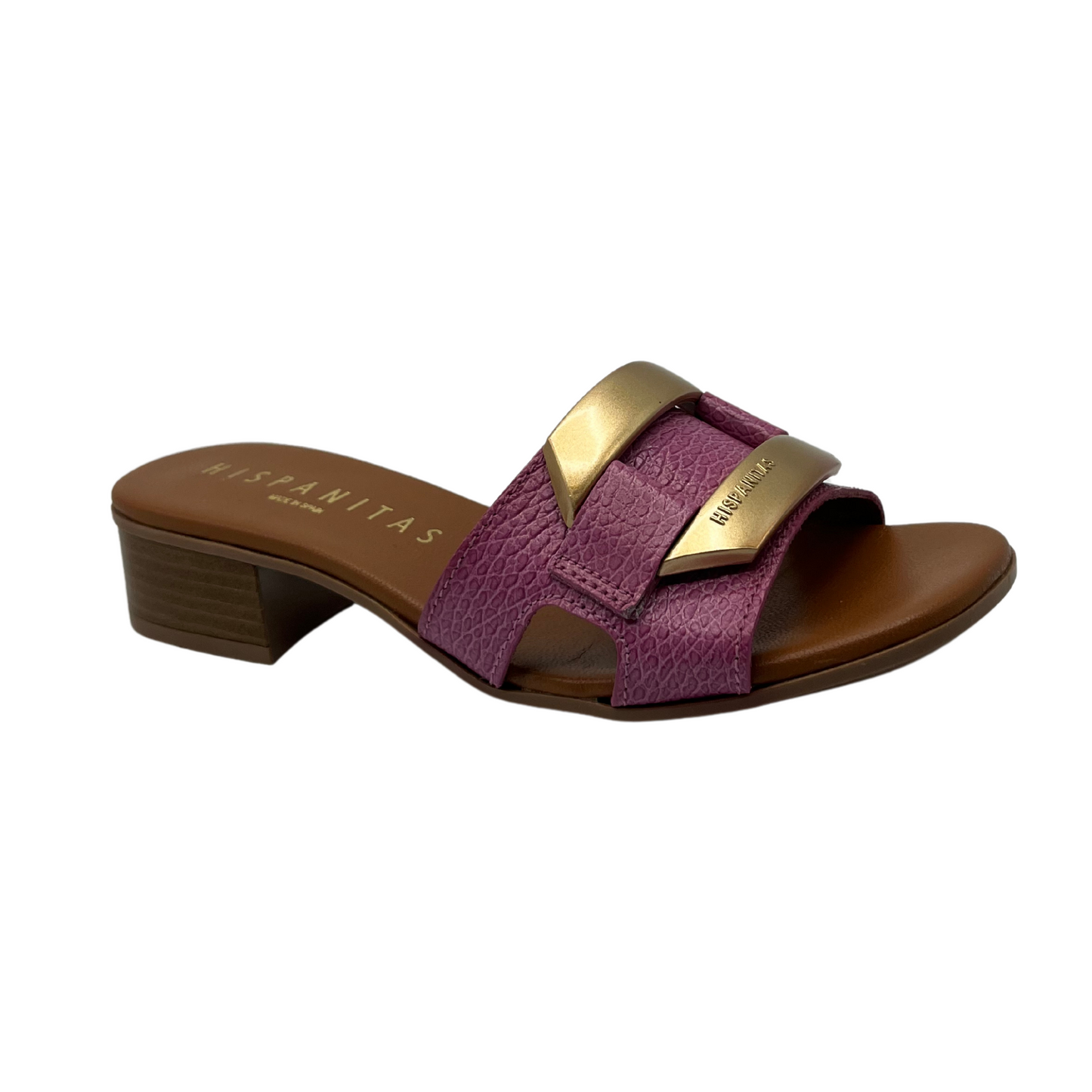 Right facing view of pink and brown leather sandal with gold brooch detail on upper