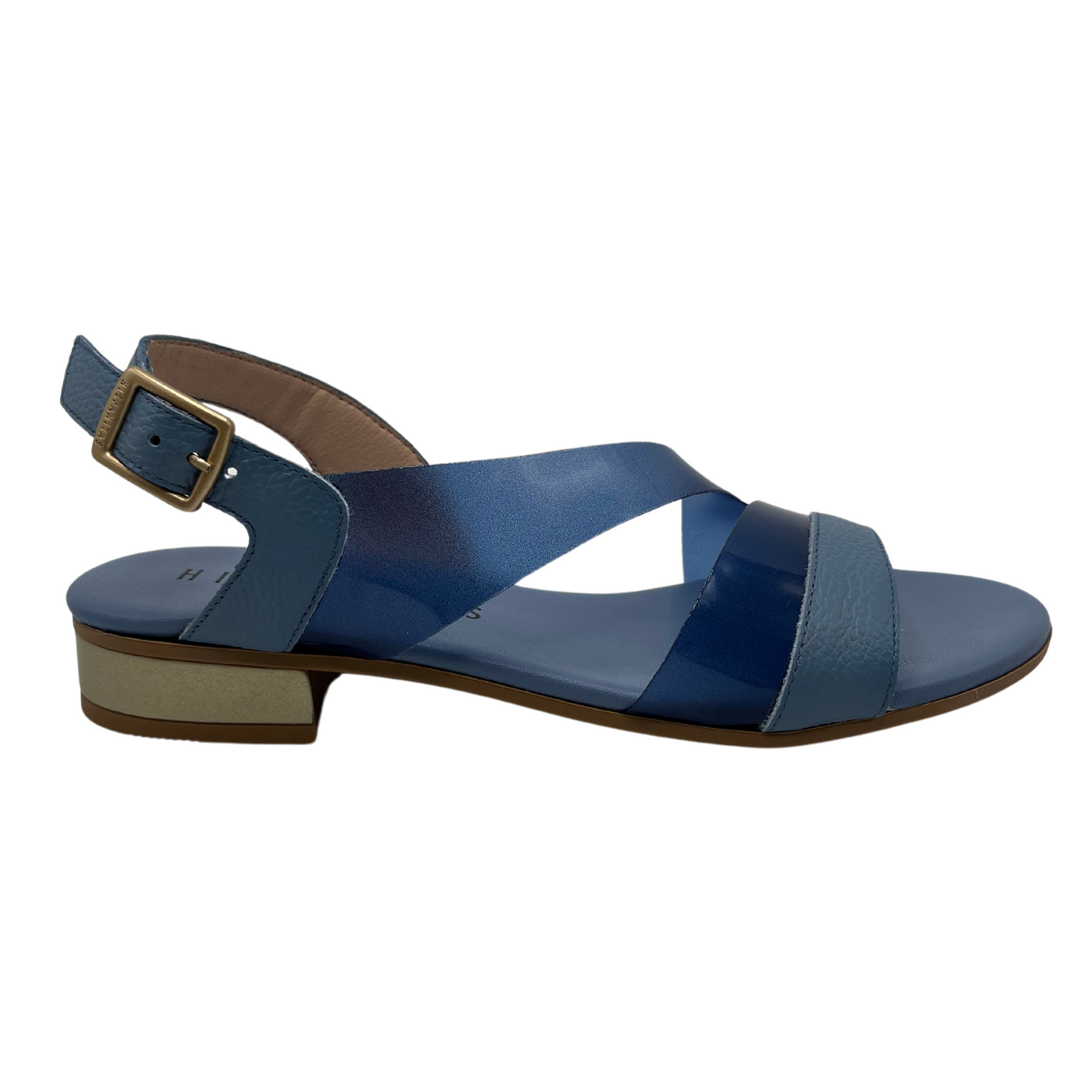 Right facing view of blue leather and vinyl sandal with buckle strap and low heel