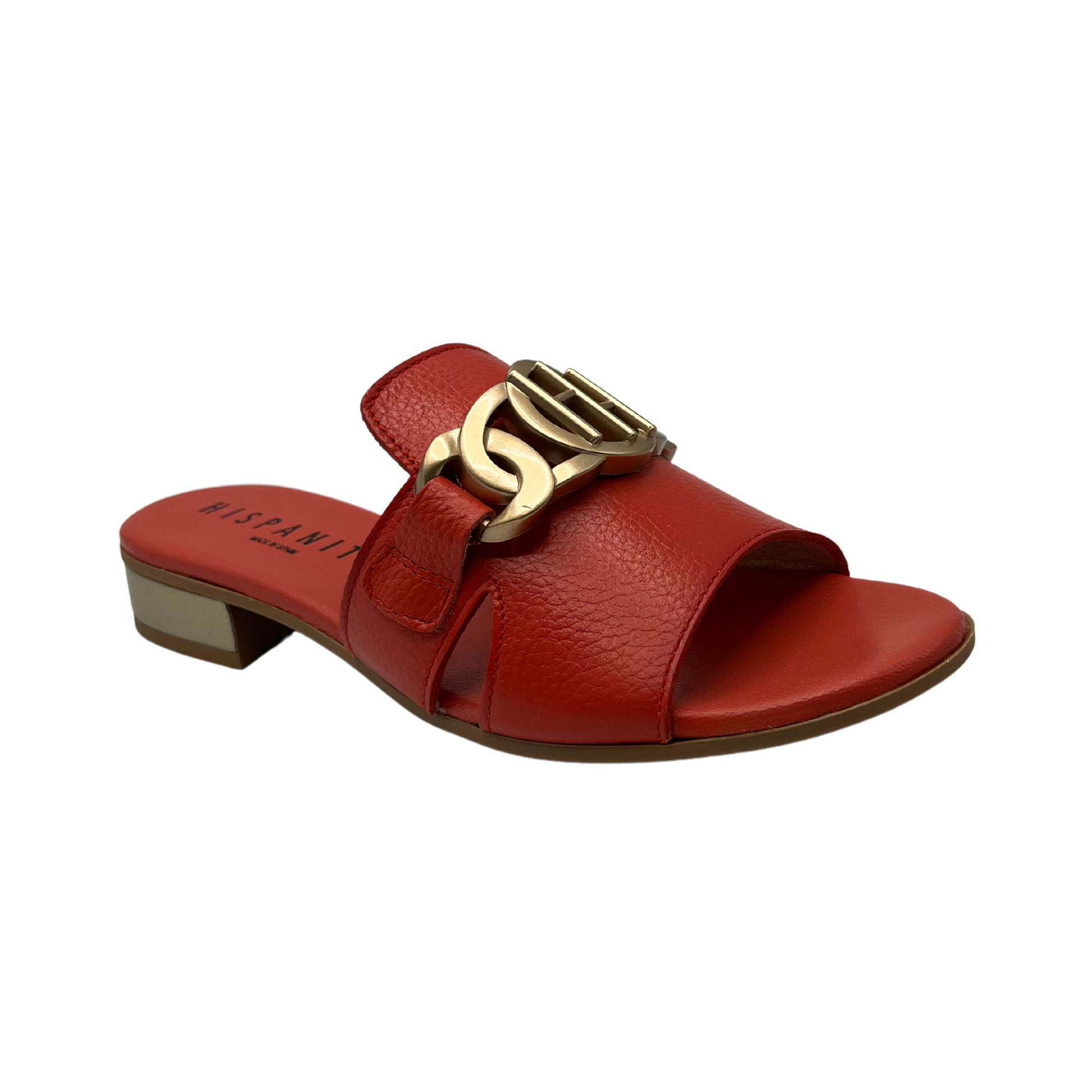 45 degree angled view of scarlett leather slip on sandal with a low block heel and gold detail on upper.