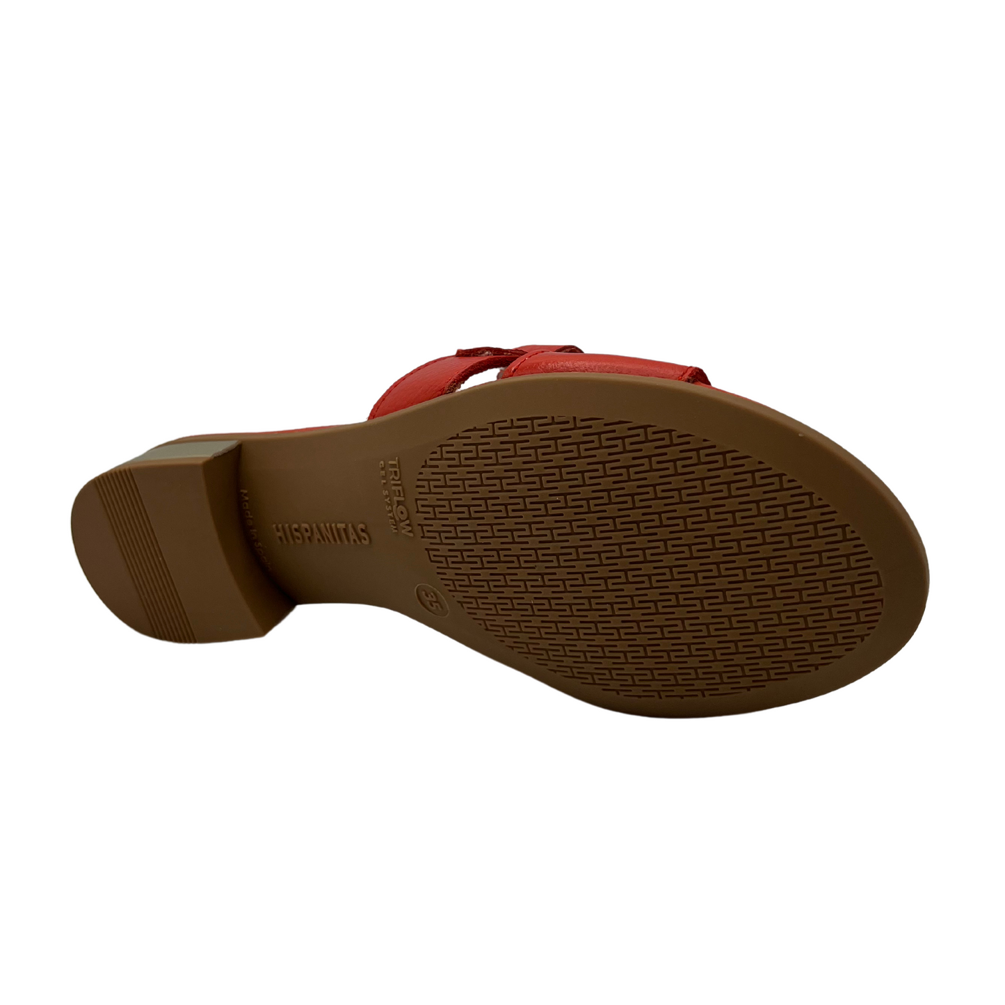 Bottom view of scarlet leather slip on sandal with a low block heel and gold detail on upper.