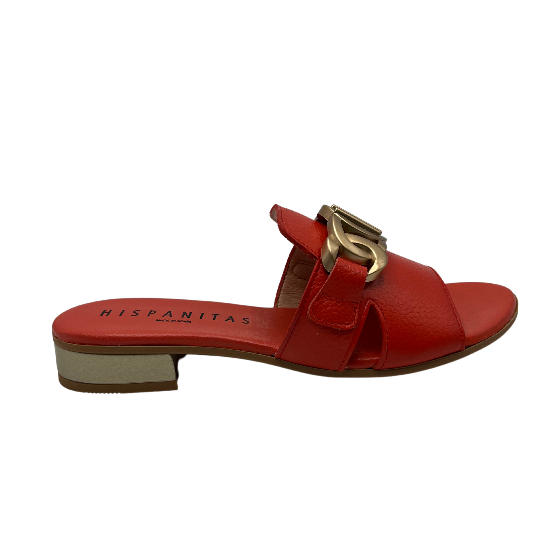 Right facing view of scarlet leather slip on sandal with a low block heel and gold detail on upper.