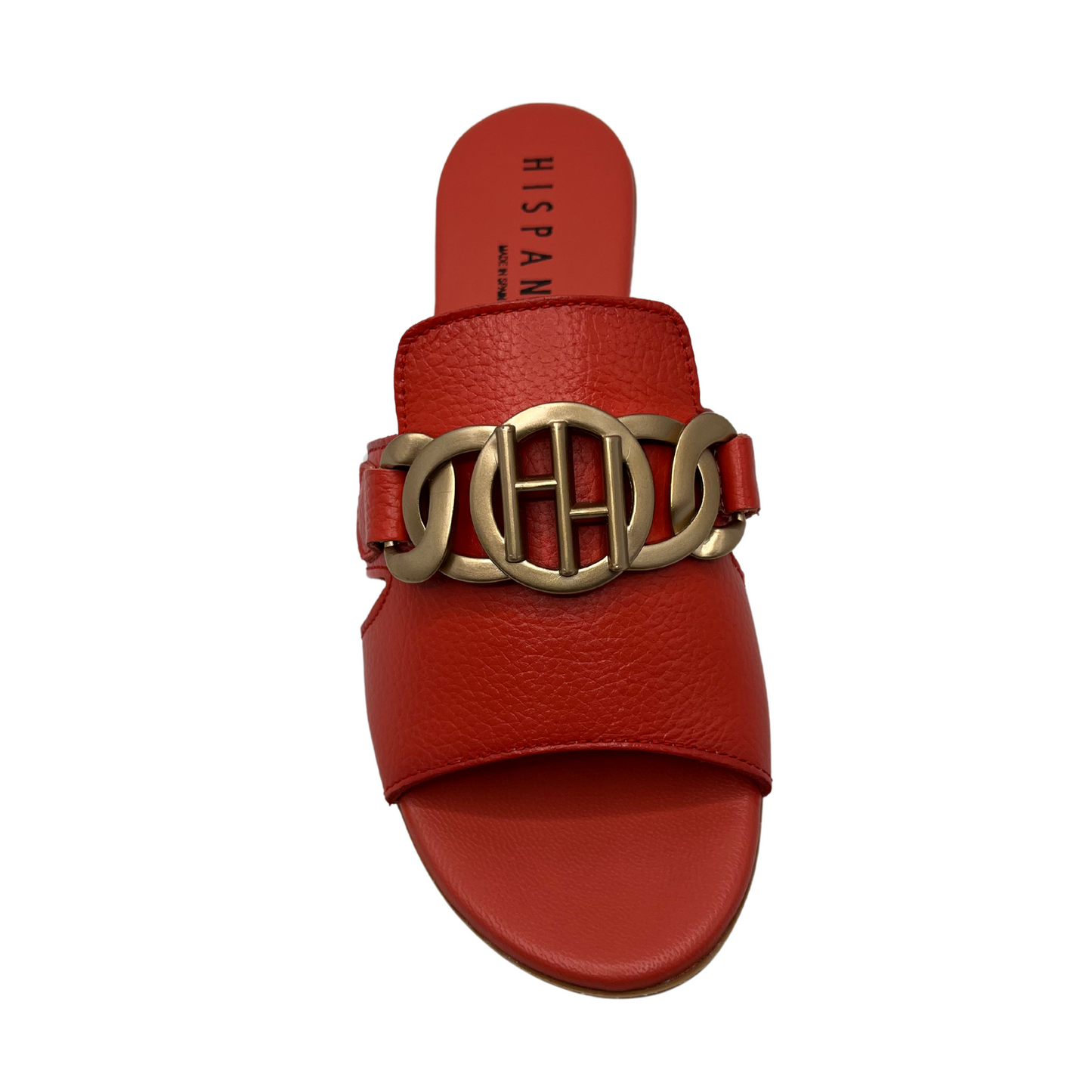 Top view of scarlet leather slip on sandal with a low block heel and gold detail on upper.