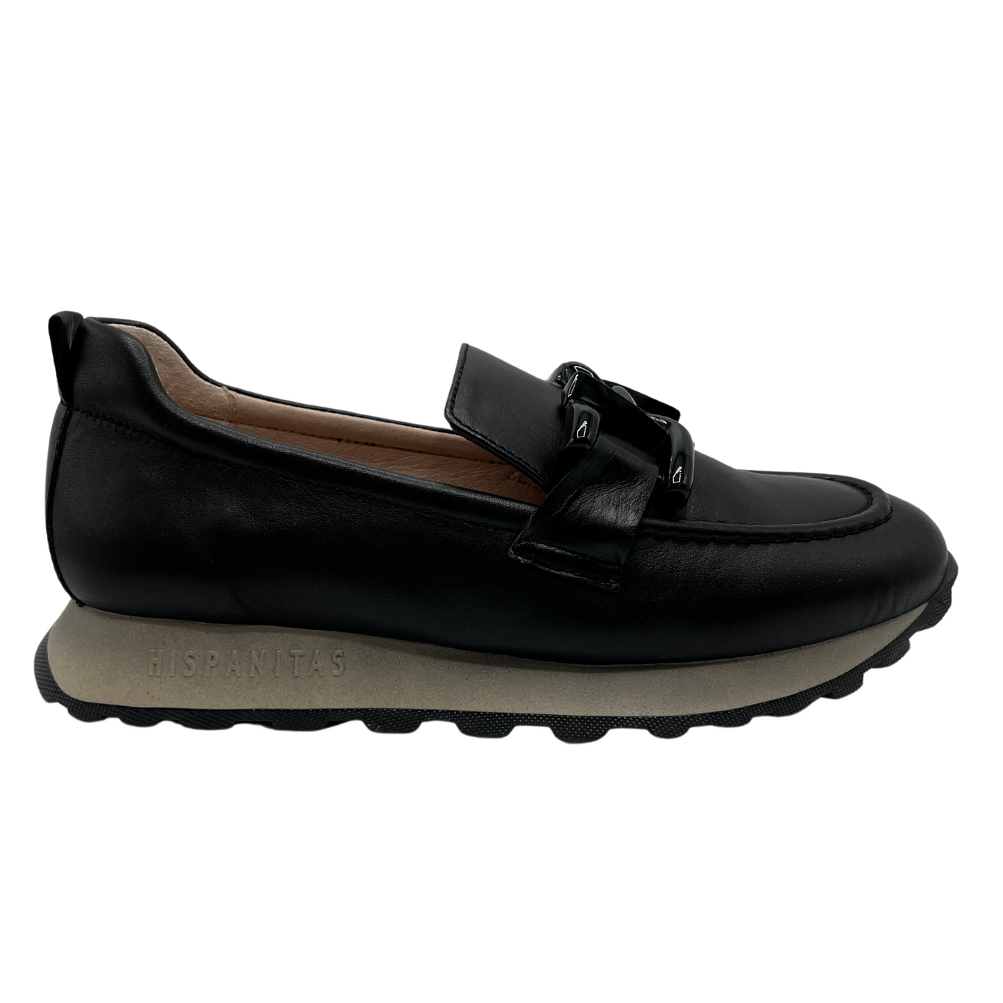 Right facing view of black leather loafer with chunky treaded sole and leather lining