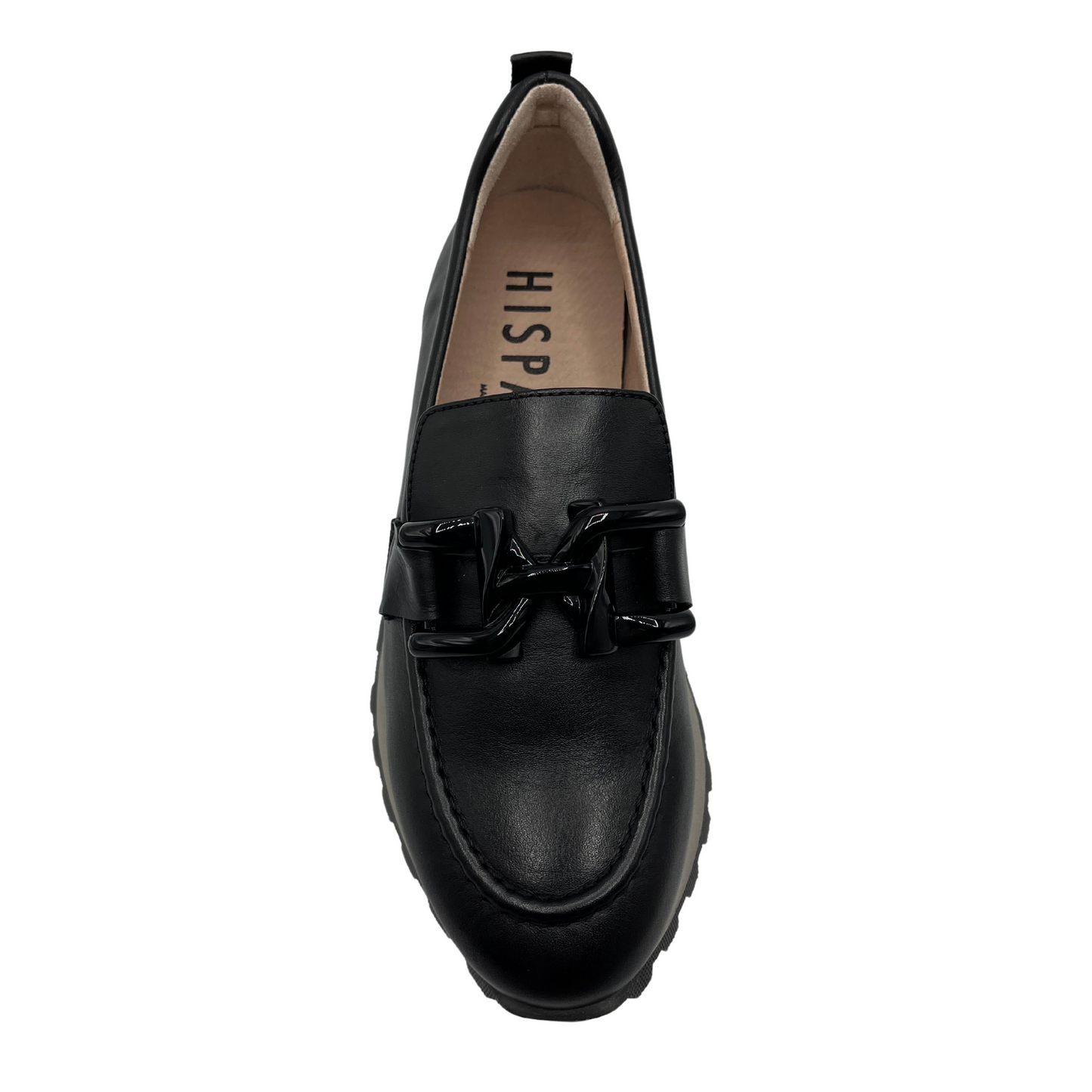 Top view of black leather loafer with chunky treaded sole and leather lining