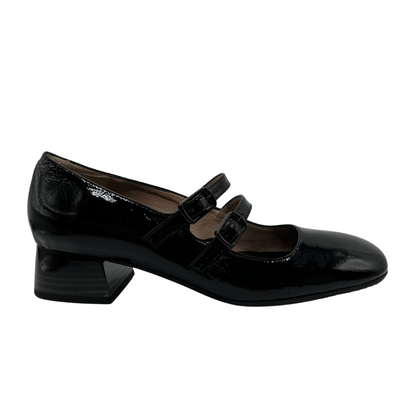 Right facing view of black patent leather mary jane with double straps and block heel