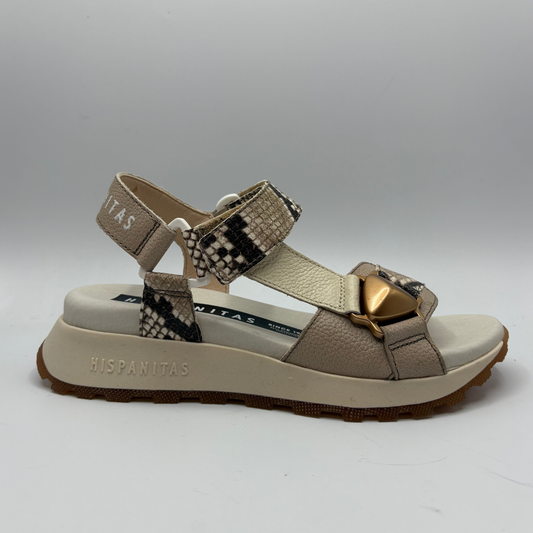 Beige sandal with snake print straps on a white background