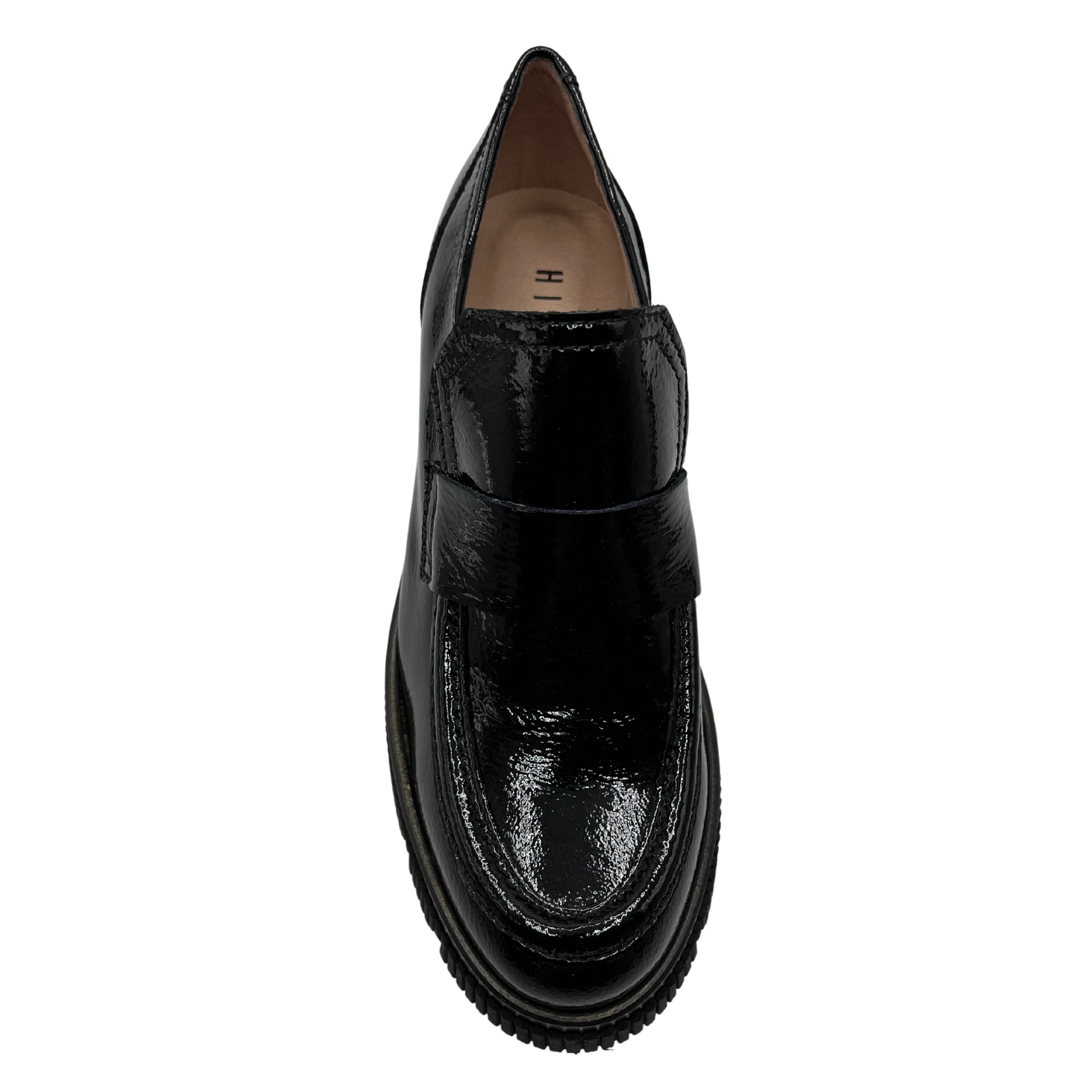 Top view of a black patent leather derby shoe with a rounded toe and platformed track heel