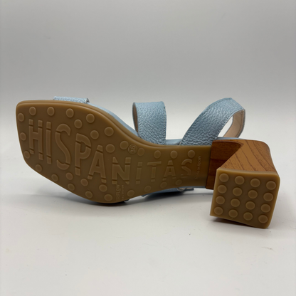 Blue sandal with a brown sole on a white background