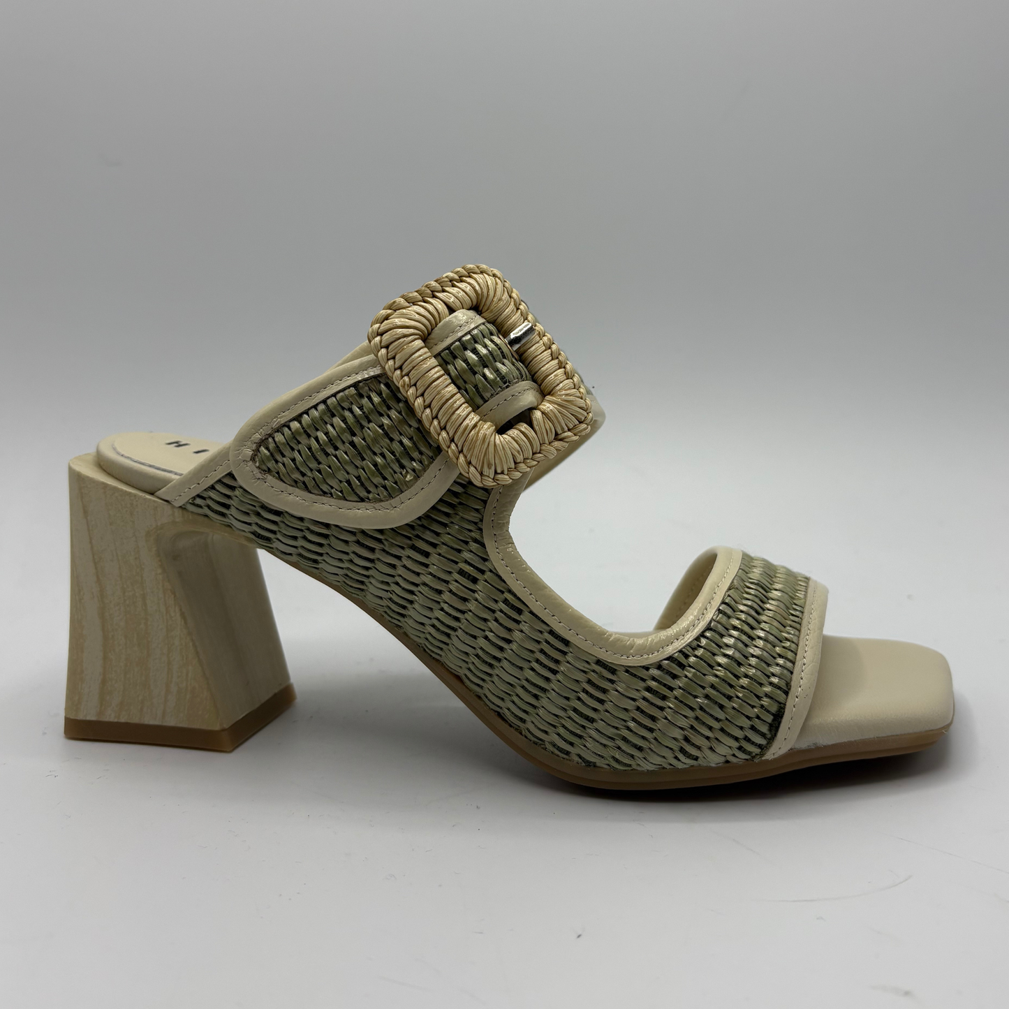 Beige and latte woven sandal with a block heel on a white background