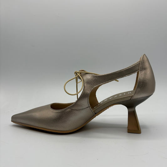 Bronze high-heeled shoe on a gray background