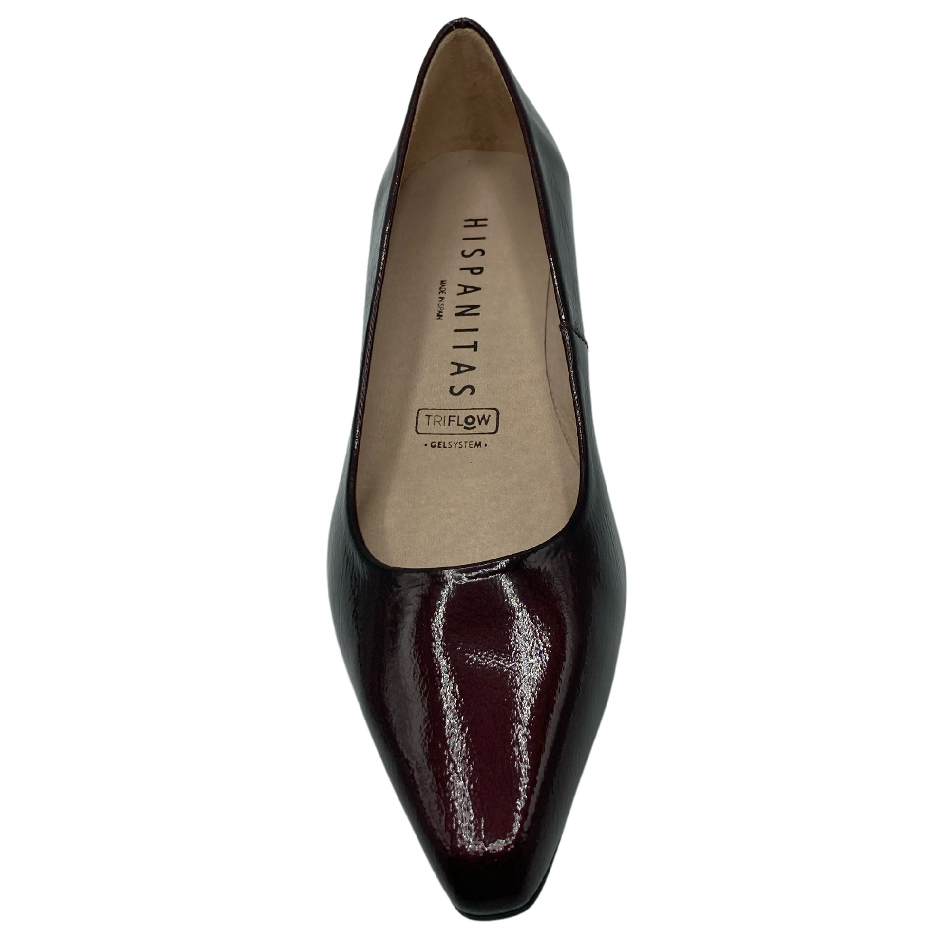 Top view of wine patent leather pointed toe pump with beige leather lining