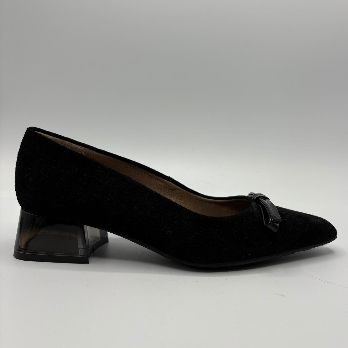 Pair of black high-heeled shoes on a white background