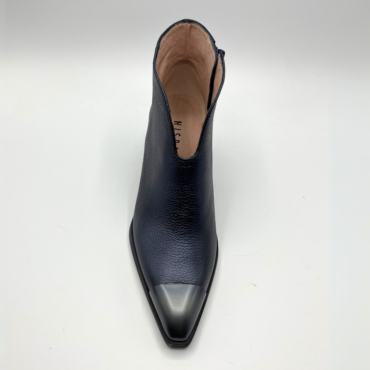 Navy leather ankle boot on a white background