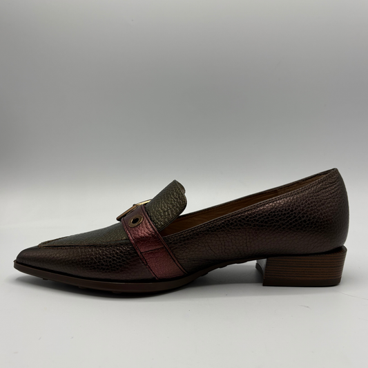 A dark brown pebbled leather loafer with a pointed toe, a low stacked heel, and a burgundy leather strap across the instep with a small gold-tone buckle.