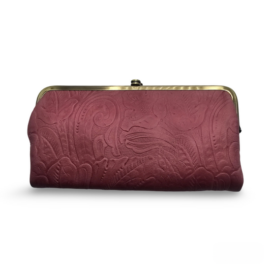 An embossed mauve leather wallet.