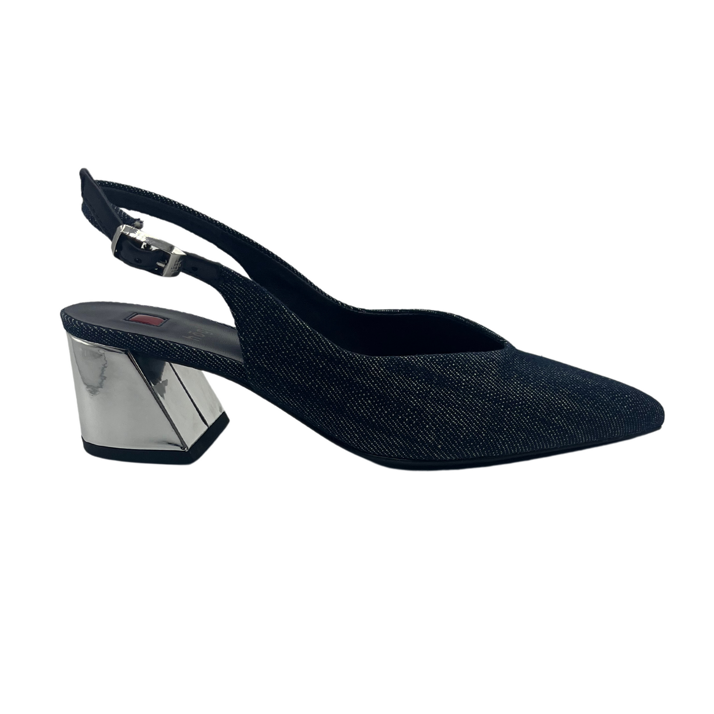 Right facing view of jean fabric pump with sling back strap, pointed toe and silver flared heel.