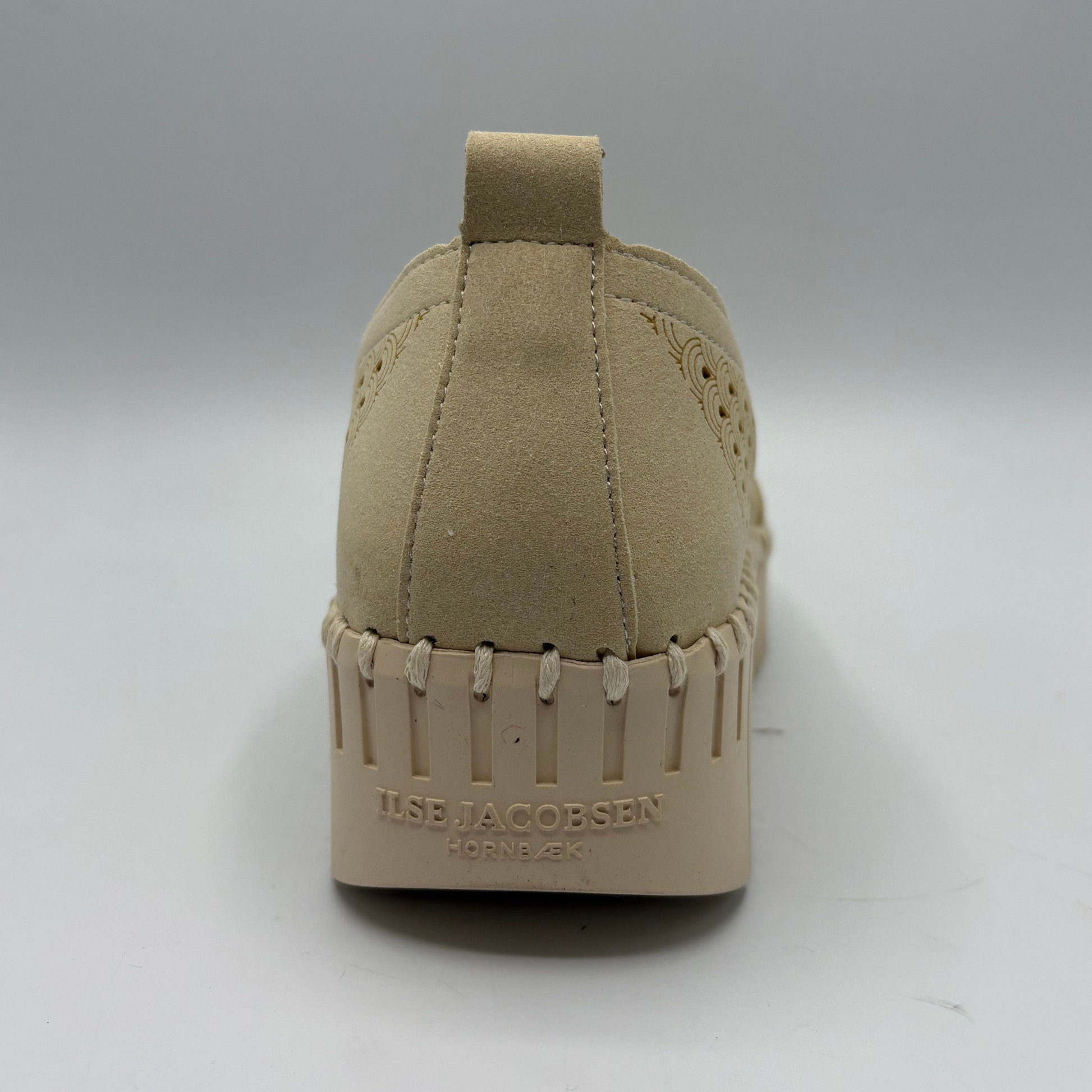 Beige shoe sole with 'Ilse Jacobsen' branding on a white background