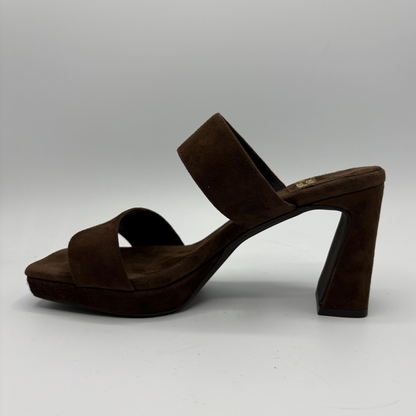 Brown suede sandal on a gray background