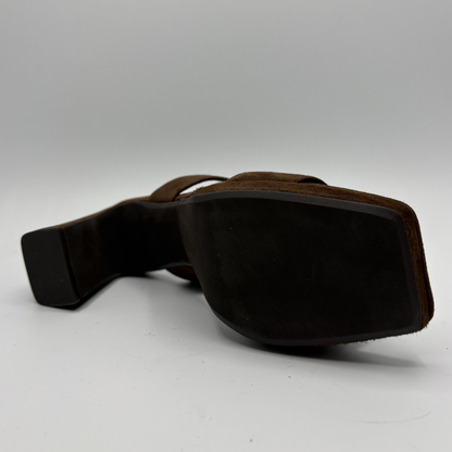 Brown leather belt on a white background