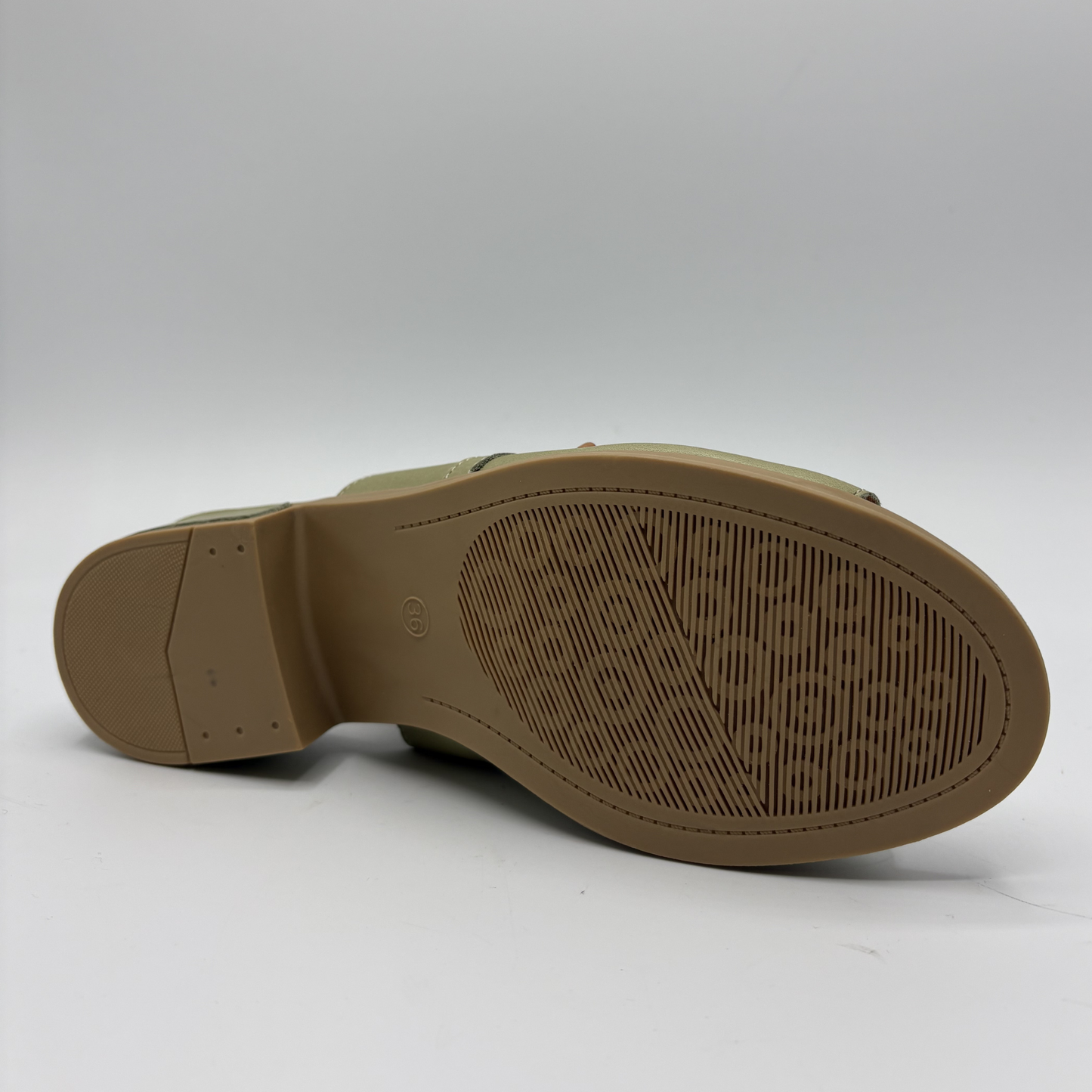 Brown shoe sole on a white background