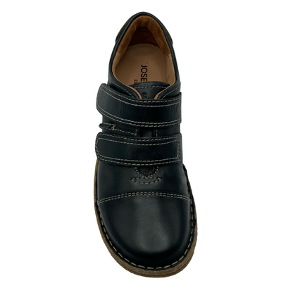 Top view of black leather walking shoe with rounded toe and double velcro straps