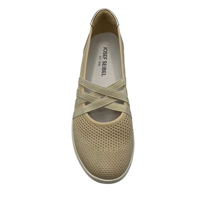 Top view of a cream mesh sneaker with elasticated straps, suede heel cap and white rubber outsole.